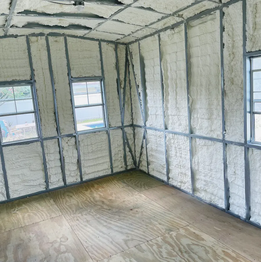 Closed-cell spray foam insulation applied to wall cavities in a residential project in St. Michael